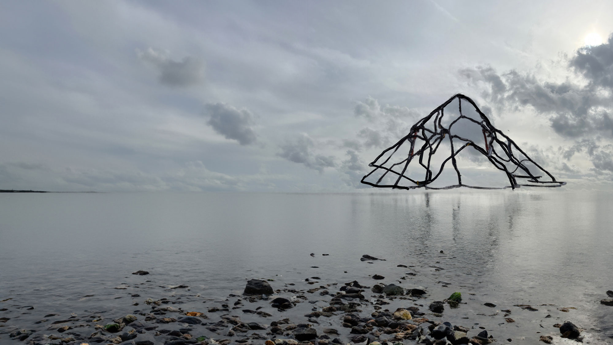 a volcano sculpture floating above a river