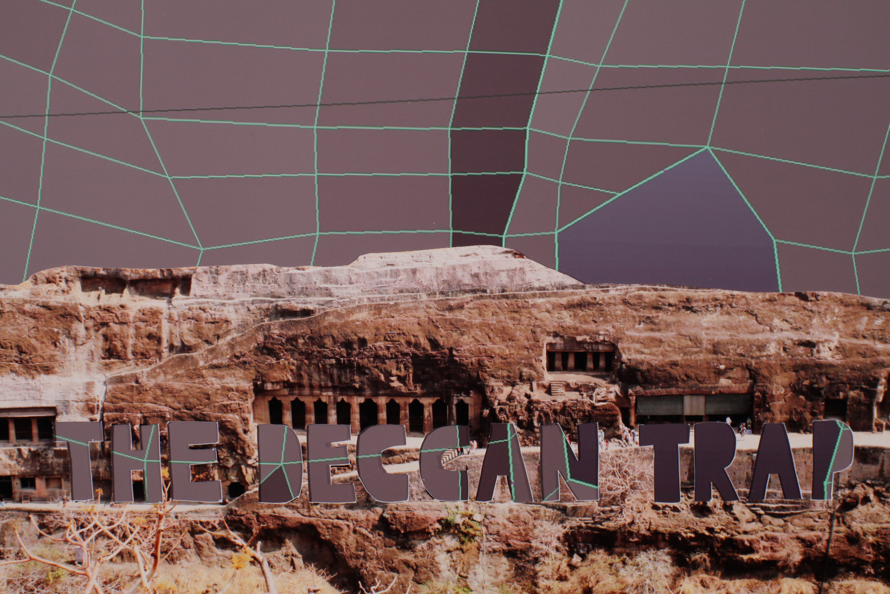 The Deccan Trap in blocky font in a desert scene 