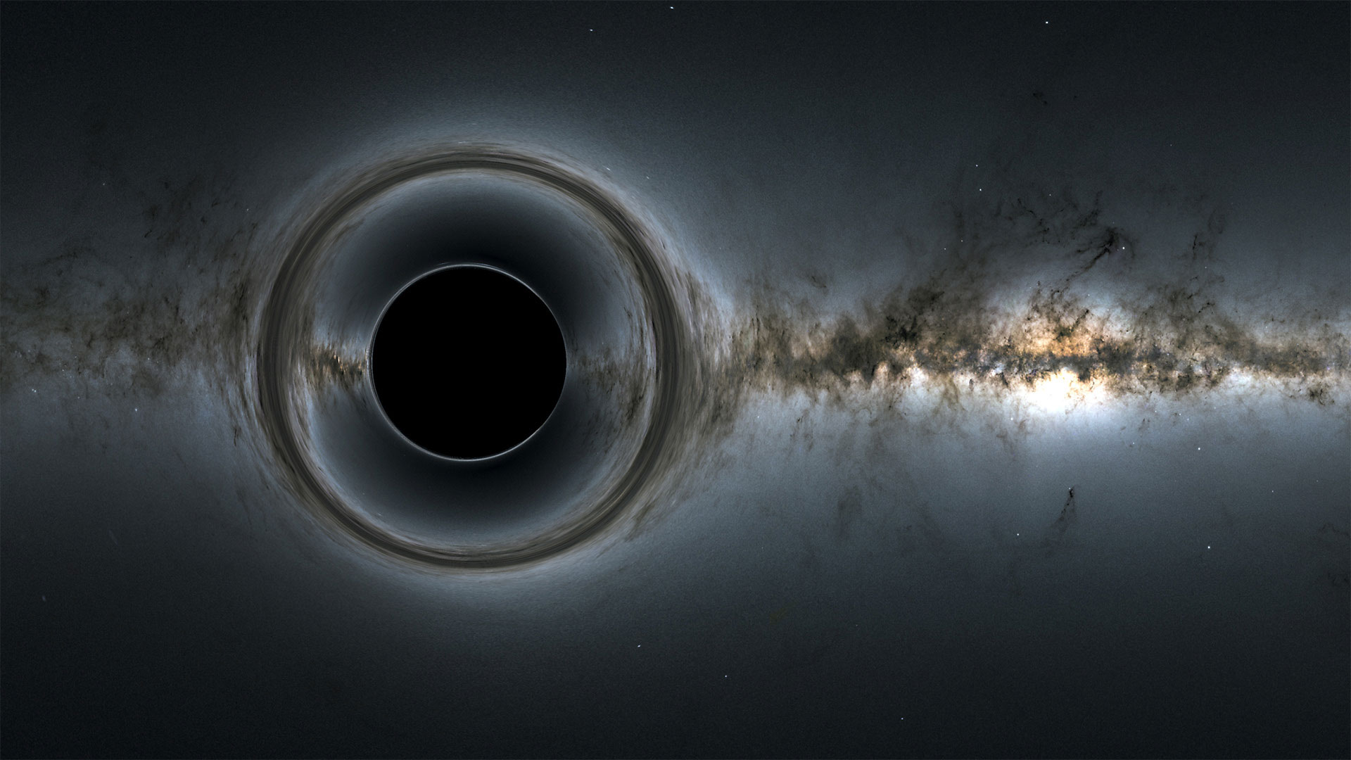 A simulation of a supermassive black hole distorting the milky way like background. 