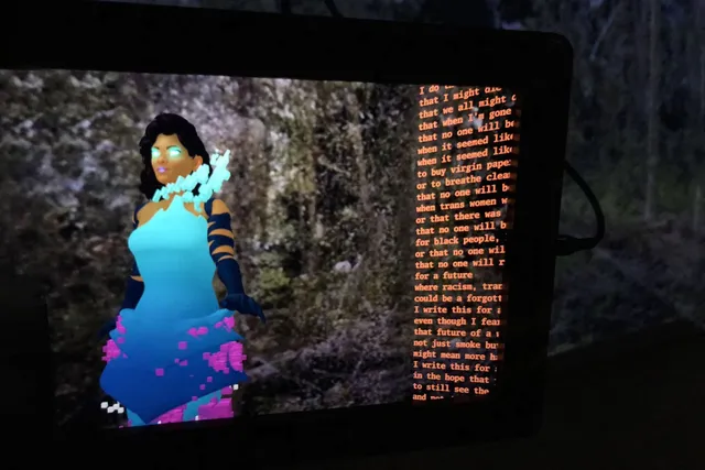 a VR representation of a femal in a blue dress