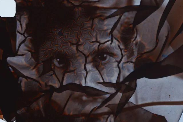 a stylized cracked face of a child