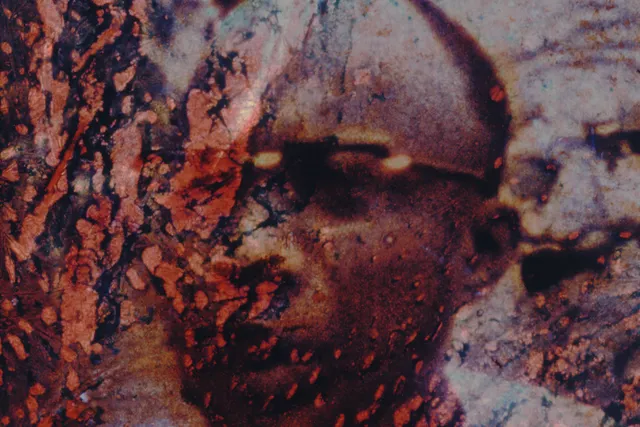 a face in a stylized film still