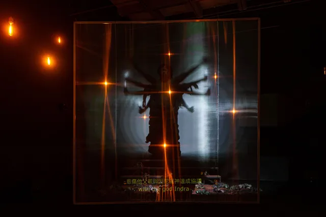 a Bodhisattva on a projected screen 