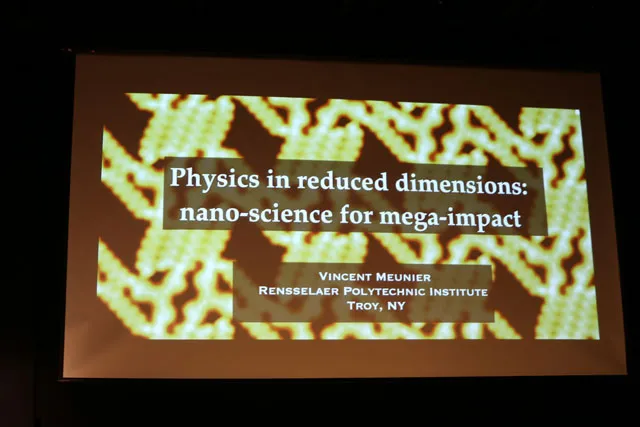 Physics in reduced dimensions: nano-science for mega-impact in white font on a background of yellow squiggly lines. 