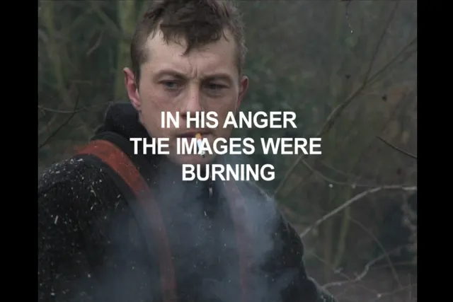A man in the woods with a cigarette hanging from his mouth with white text over his face reading "in her mind the images were burning". 