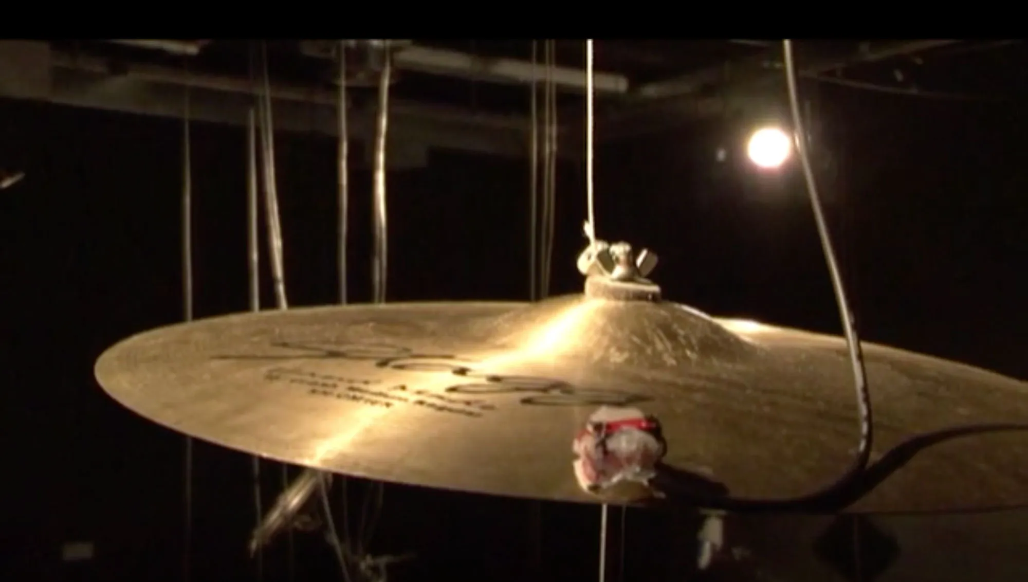a cymbal with a transducer mic on it