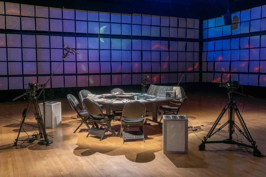 a gaming table sitting in the middle of a white box studio