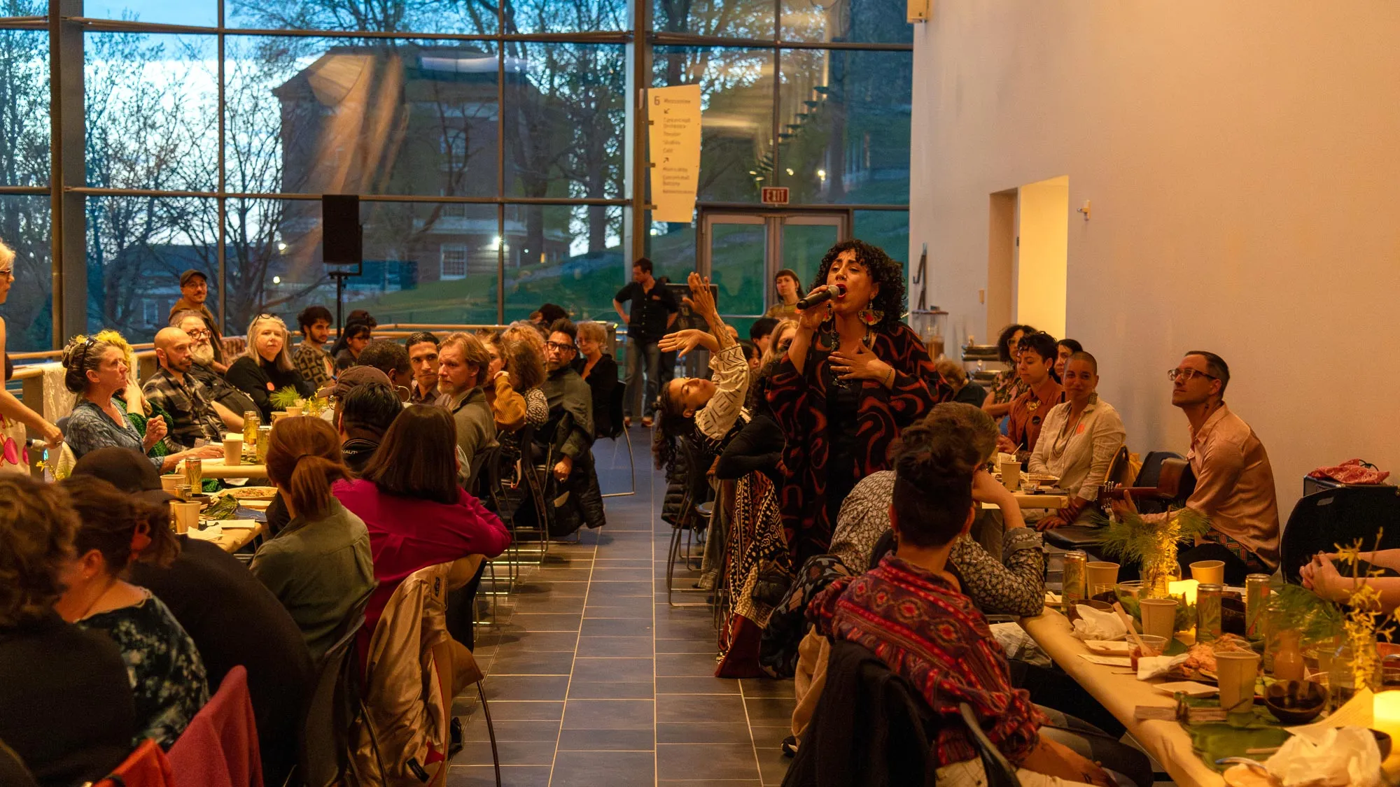 a long table meal on the mezzanine of a performing arts center